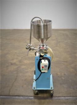 A stainless steel hopper with attached tubing and controls is mounted on a blue, wheeled base. Positioned on a concrete floor, this machine is ready for your next Industrial Auction in an industrial setting.